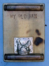 unusual handmade cupboard made from chopping boards & kitchenalia