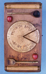 unusual handmade cupboard made from chopping boards & kitchenalia