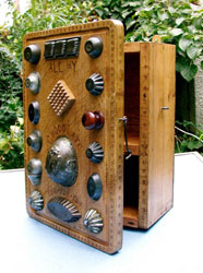 unusual handmade cupboard made from chopping boards & kitchenalia
